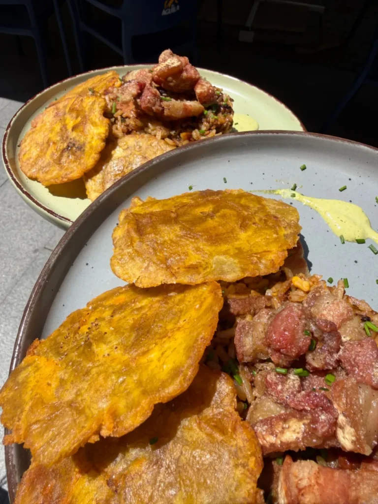Arroz tequendama with crispy pork belly and patacones