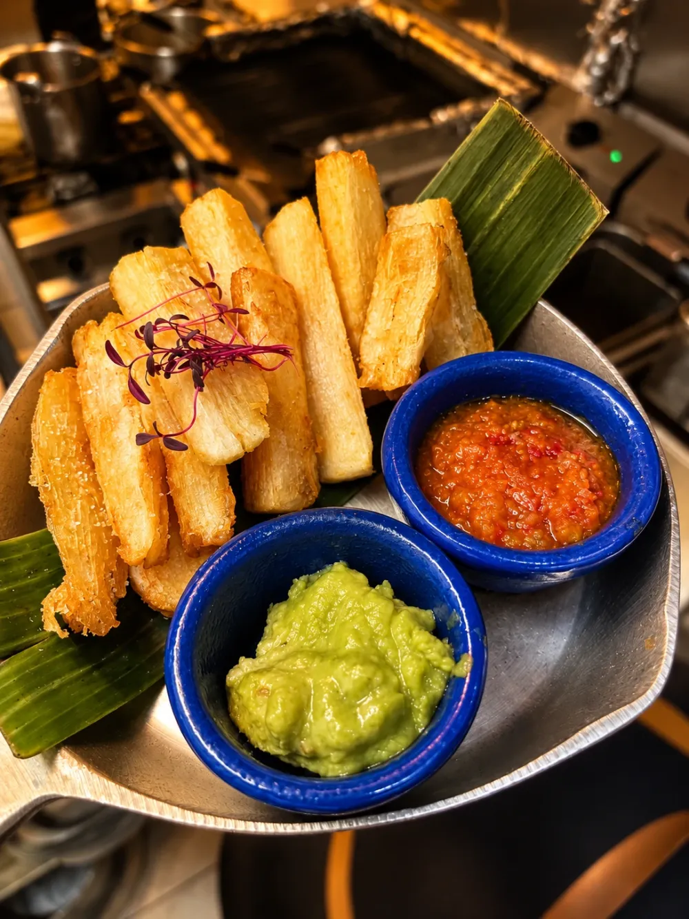 Crispy yuca with hogao and homemade guacamole